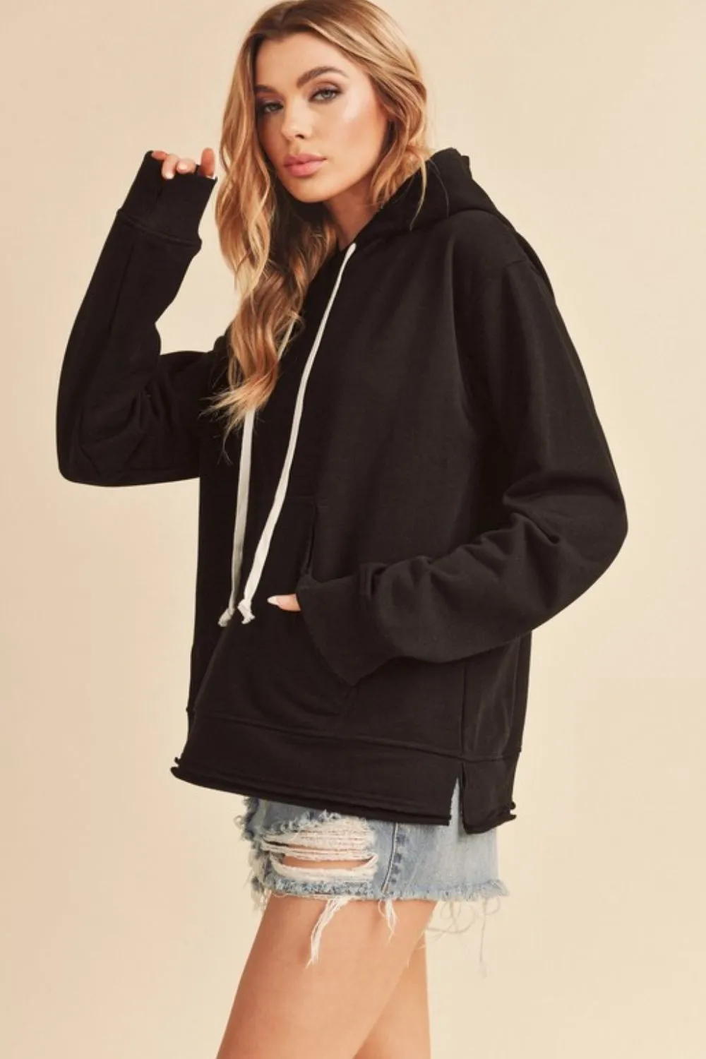 Aemi   Co Raw Hem Kangaroo Pocketed Drawstring Hoodie