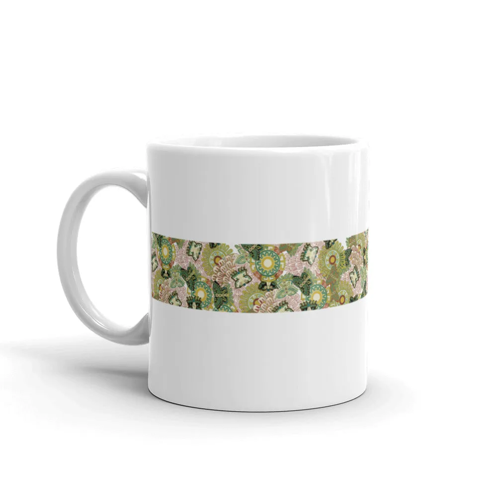 Mug, ceramic featuring a pattern of pre-Columbian butterfly and floral illustrations of Mexican origin, white